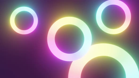 Spinning Glowing Neon Rainbow Rings Circles Rotating Float Neon Light - 4K alt