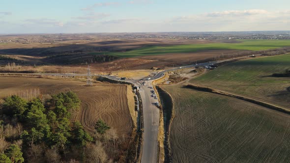Unfinished Ring On The Road, With Traffic. Road Construction alt