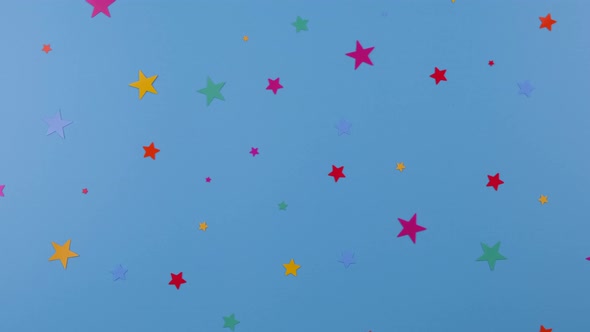 Rotating Blue Background with Multicolored Stars Concept for Celebrating a Boy's Birthday or a Party