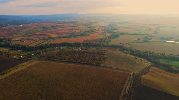 Sunset over the fields of western Ukraine. Aerial view.