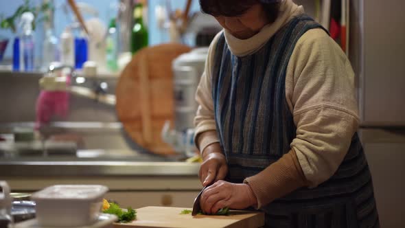 woman cooking at home alt