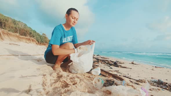 Young Woman Volunteer Collects Fights Nondegradable Waste That Harms Beach alt