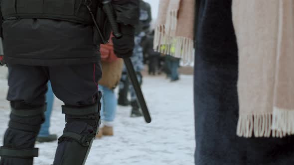 Police Baton or Billy Club Carrying Holding By Russian Riot Team Policeman