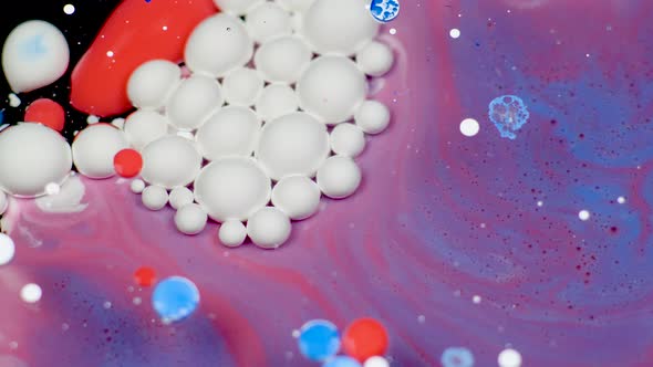 Amazing White Bubbles of Paint on the Purple Oil Surface. Paint in Oil alt