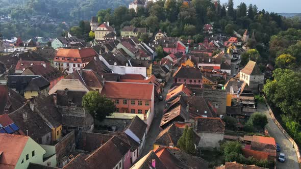 Aerial drone view of the Historic Centre of Sighisoara, Romania. Old buildings alt