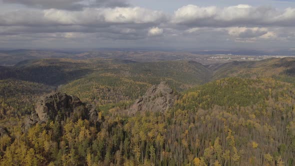Aerial View of Autumn Forest and Granite Rocks in the Siberian Nature Reserve Stolby.