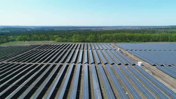 Aerial View of Solar Power Station Field at Sunny Day. Aerial Top View of Solar Farm. Renewable alt