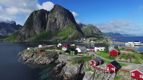 Flying above fishing village Hamnoya on Lofoten islands. alt