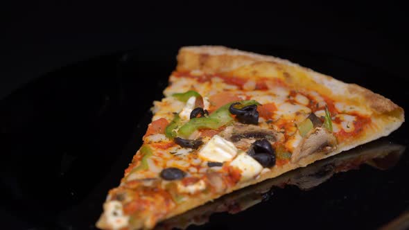 Piece Slice of Pizza with Vegetables and Cheese