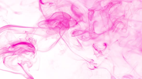Super Slow Motion Shot of Flowing Pink Smoke Isolated on White Background at 1000Fps. alt