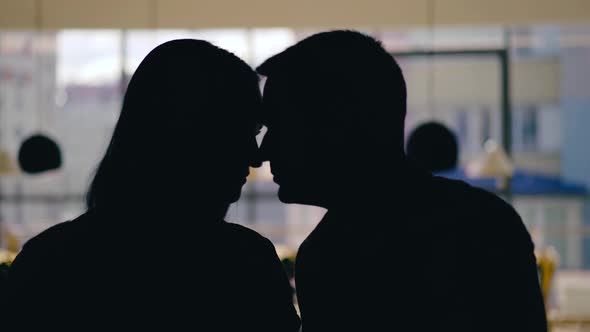 Silhouettes of Man and Woman alt