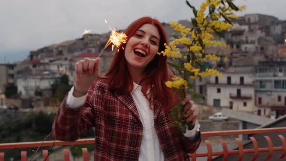 Young Beautiful Italian Girl Celebrates Women's Day with Sparkling and Mimosa alt