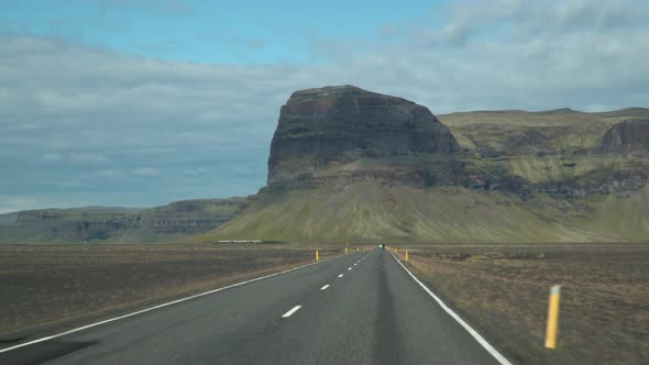 Car Driving on the Road To Iceland alt