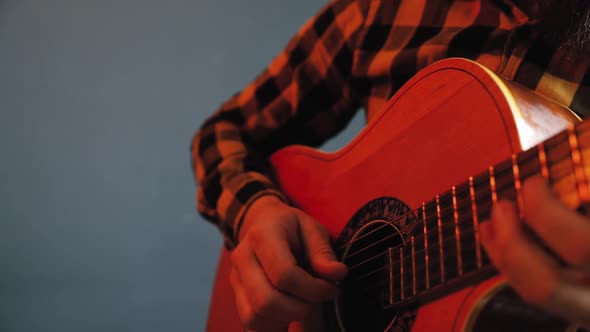 Man Play Acoustic Guitar At Blue Wall Stock Footage Videohive 8142