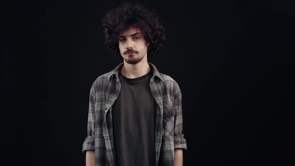 The Disturbed Young Man Says No and Looks Upset at the Sign of Dislike alt