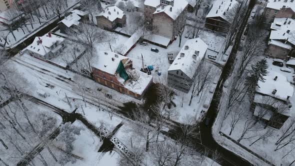 Damaged Old Appartment Building is Demolished By Crane Operation Team alt