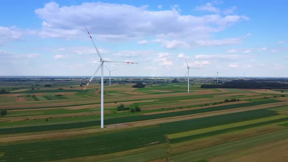 Arrays of Large Turbines From a Drone in Summer alt