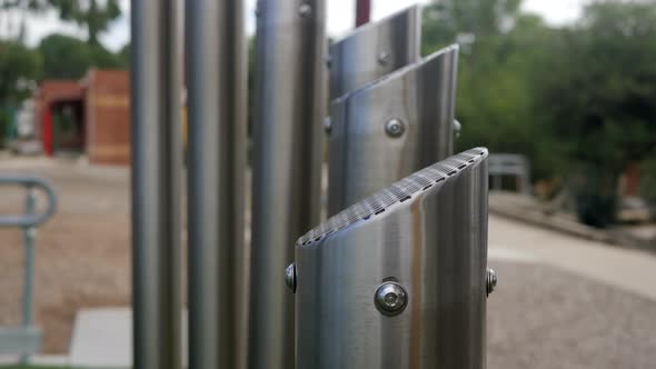 CLOSE UP, Outdoor Music Pipes At Primary School Playground alt