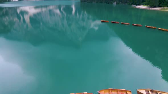 Beautiful Landscape of Braies Lake Lago Di Braies Romantic Place with Wooden Bridge and Boats on the alt