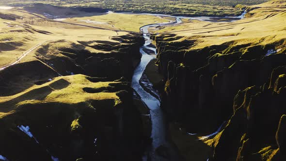 Drone Over Fjaora River And Sunlit Fjaorargljufur Canyon alt