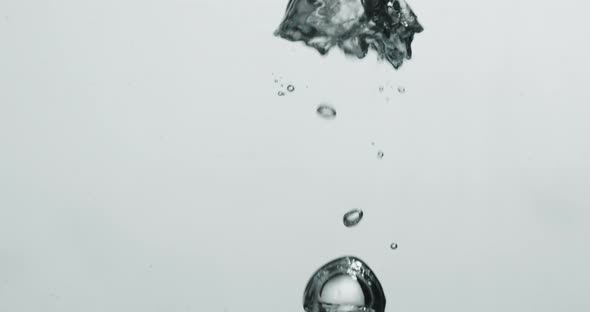 Rising Abstract Shaped Bubbles Moving Up In Water alt