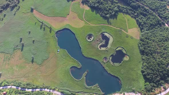 Aerial view of lakes called Sarena jezera near town of Knin alt
