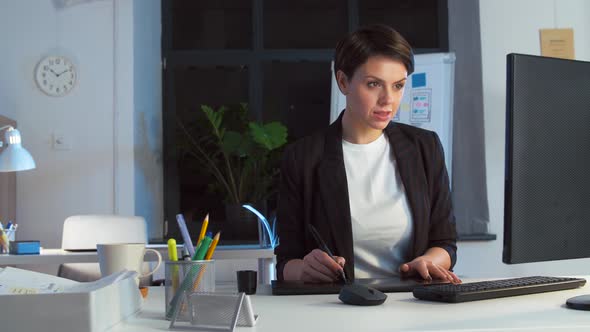 Designer with Computer and Pen Tablet at Office 60 alt
