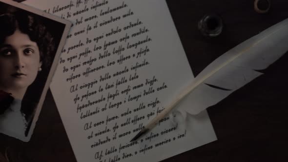 Close up of handwritten letter and extinguished candle