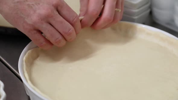 Hands Preparing Pie Pastry Dough For Tart - close up alt