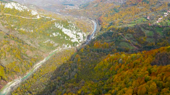 steep green mountains, deep forest and mountain road, beautiful valley and river alt