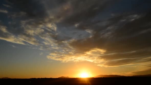 Time Lapse Of Sunset And Speed Clouds alt