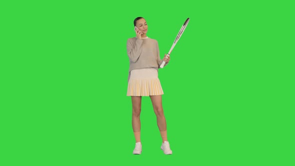 Young Woman Tennis Player Making a Call on a Green Screen Chroma Key