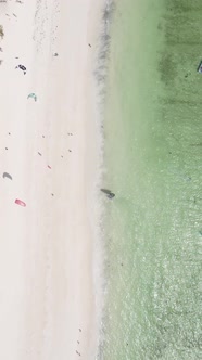 Vertical Video Boats in the Ocean Near the Coast of Zanzibar Tanzania alt