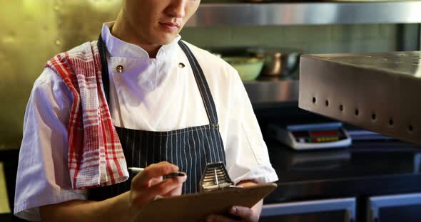 Chef working in a restaurant alt
