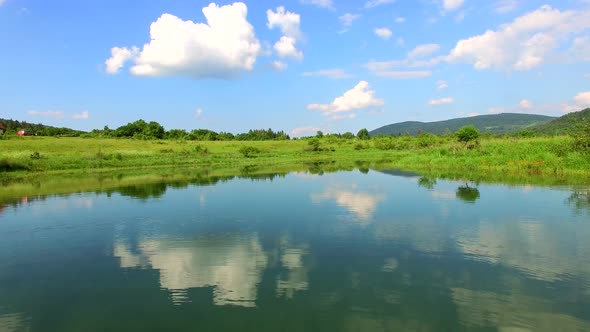 Aerial view of Jesenica river and surrounding in Croatian region Lika. alt