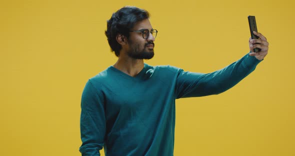 Young Man Video Chatting alt