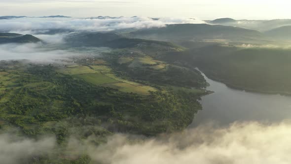 Aerial View Above River and Dam