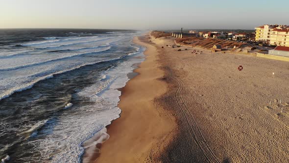 Flight on the Ocean Sandy Shore in the Early Morning Portugal Furadouro alt