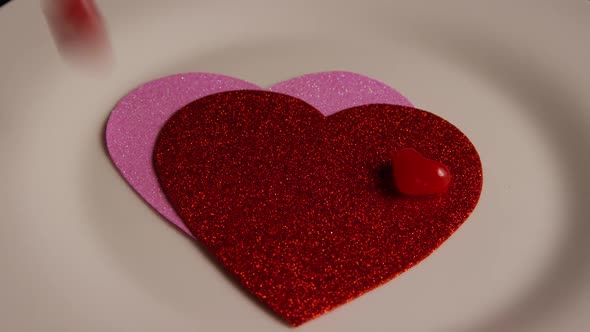 Rotating stock footage shot of Valentines decorations and candies - VALENTINES 0114 alt