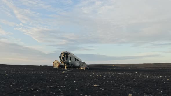 Old Airplane Wreck In Black Sand alt