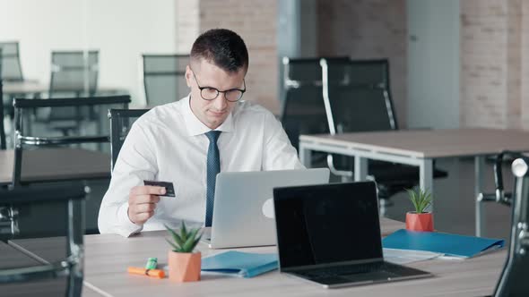 Manager Shows Positive Emotion After Online Shopping alt