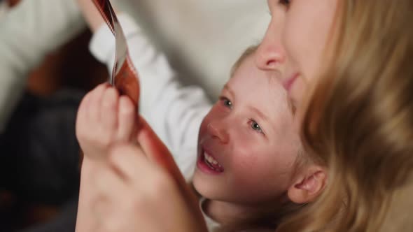 Daughter Looks at Family Shoots on Film with Young Mother alt