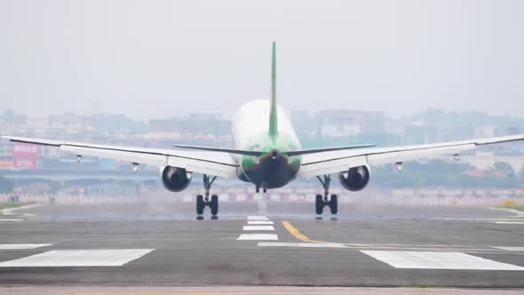 Mid-size Plane is Landing on the Runway