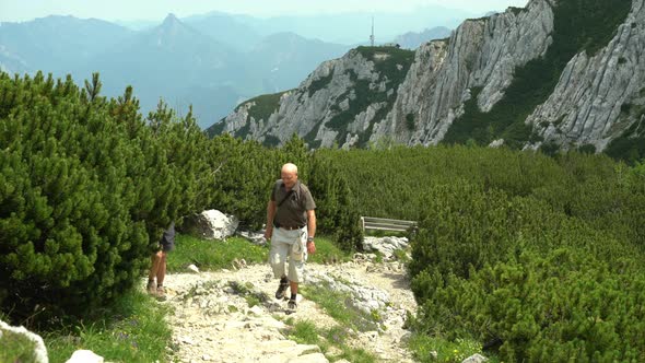 Active Seniors Hiking in Alpine Terrain