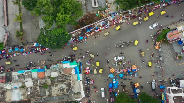 Top down approaching view of busy intersection in Bangalore India alt