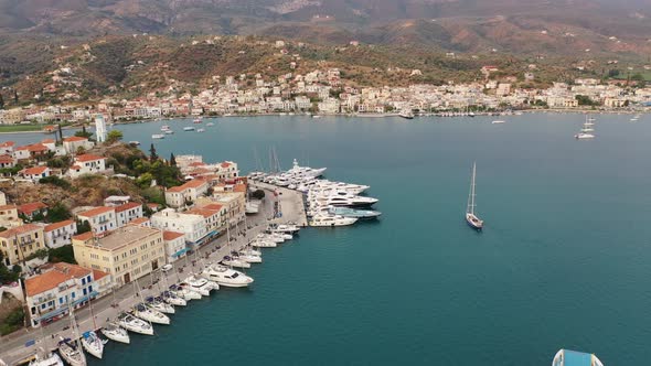 Aerial View of Poros Old Town and Marina or Seaport Greece  Drone Videography alt