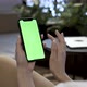 Female User Swiping On Smartphone With Green Screen - VideoHive Item for Sale