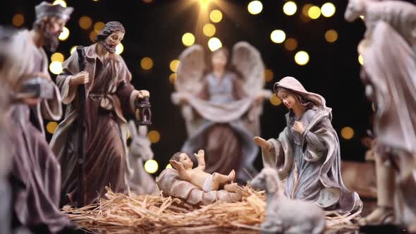 Jesus Christ Nativity with Figurines and Light Particles