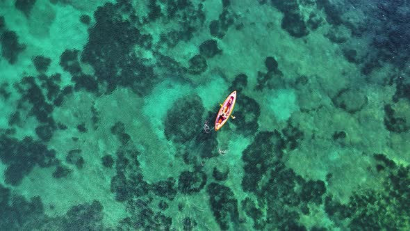 A Guy Sails in a Kayak Aerial View 4 K alt