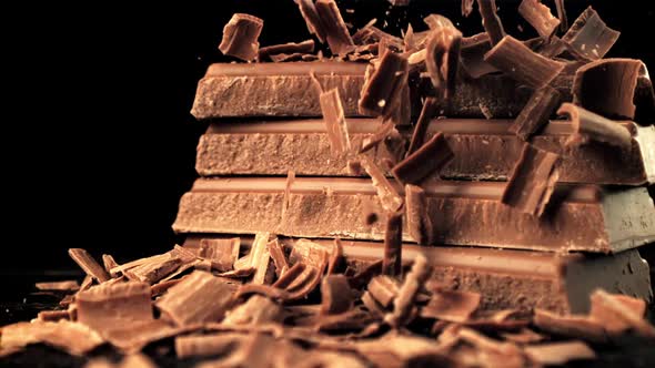 Super Slow Motion Falling Pieces of Milk Chocolate alt
